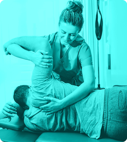 Chiropractor making a shoulder adjustment to a patient