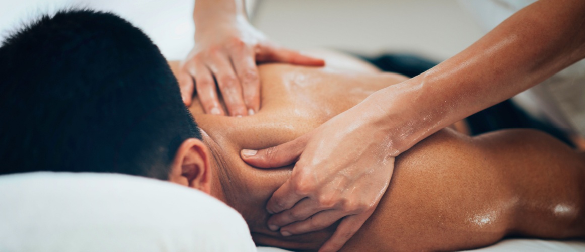 athletic man getting a sports massage